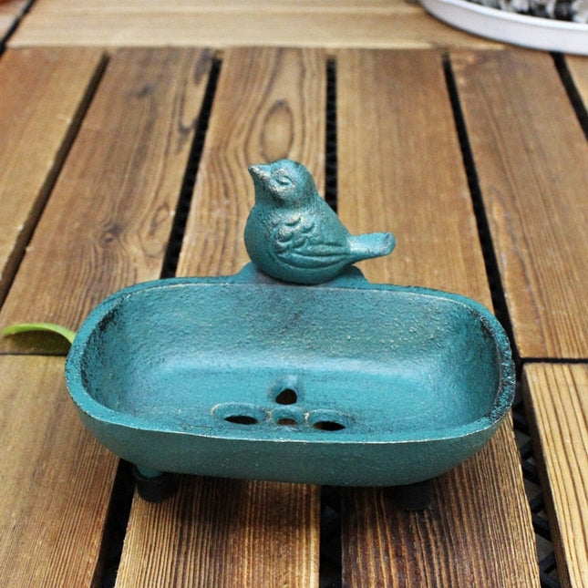 Vintage tvålkopp i gjutjärn med figur