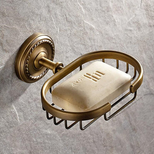 Väggmonterad tvålkorg i antik mässing
