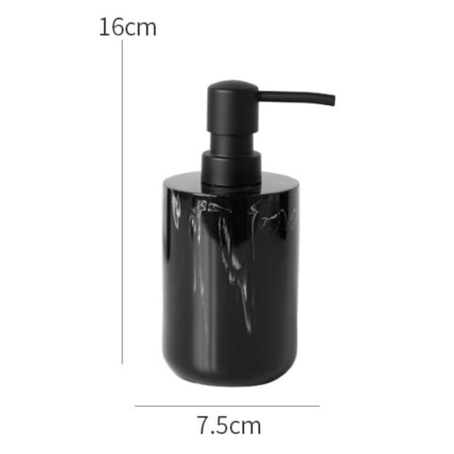 Stilren tvålpump i svart marmorimitation