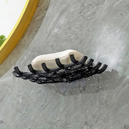 Väggmonterad dränerande tvålhållare