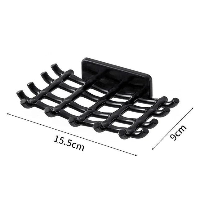 Väggmonterad dränerande tvålhållare