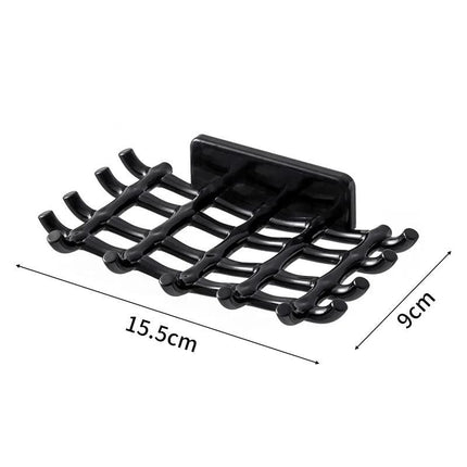 Väggmonterad dränerande tvålhållare